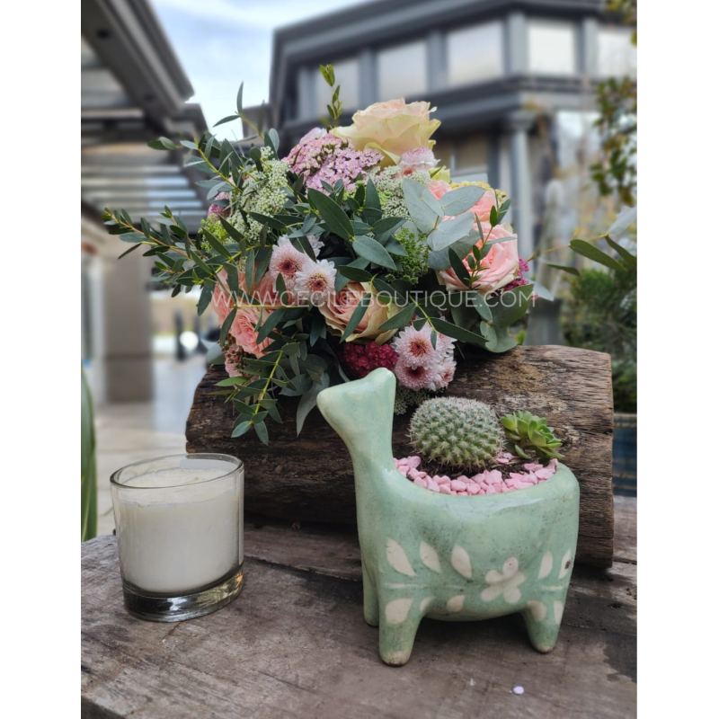 Doce harmonia| buquê de flores com um jardim e vela